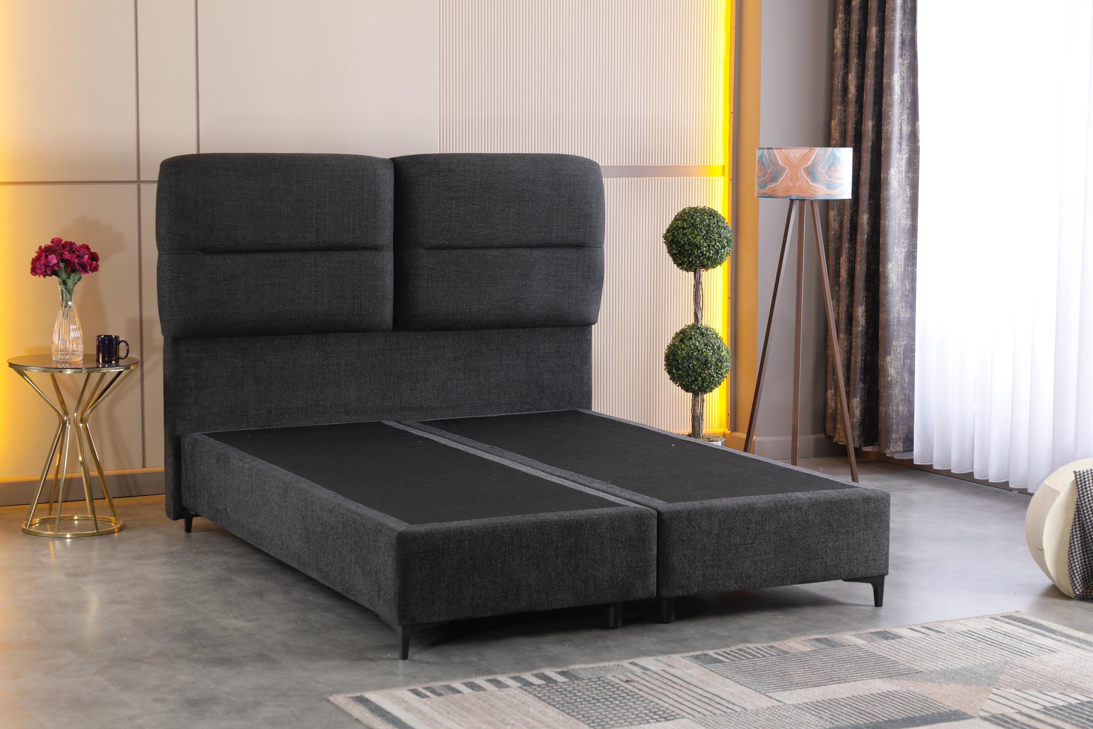 Απεικονίζεται το κρεβάτι Auro χωρίς στρώμα σε ένα δωμάτιο.